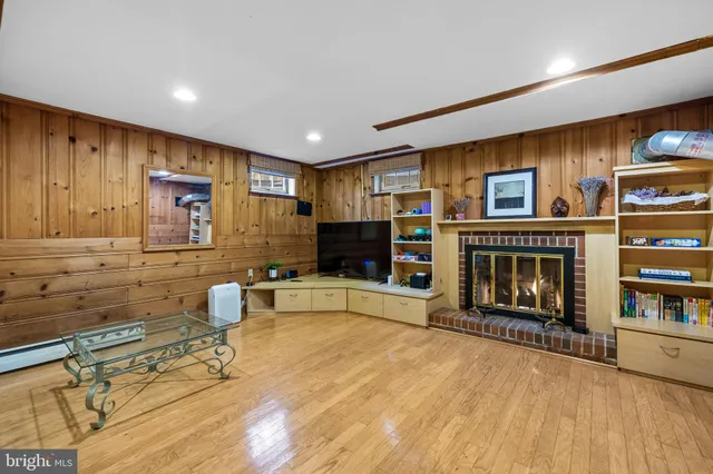 a living room with lots of furniture and lots of furniture