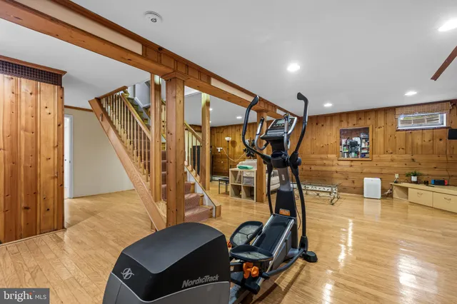 a backyard of a house with outdoor seating