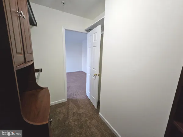 a view of hallway with shower