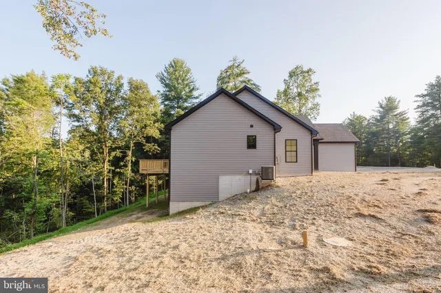 a view of a livingroom with wooden floor