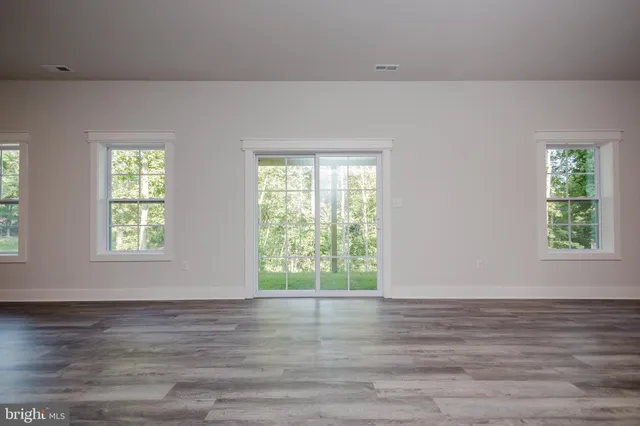 a view of a bathroom from a hallway
