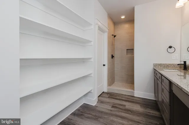 a view of bathroom with dual sinks