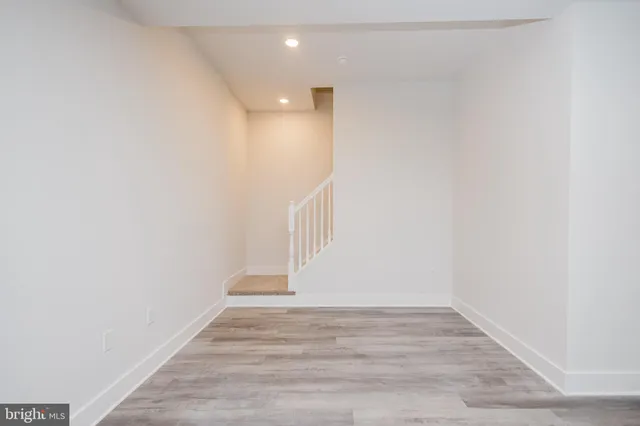 a bathroom with a toilet and a vanity