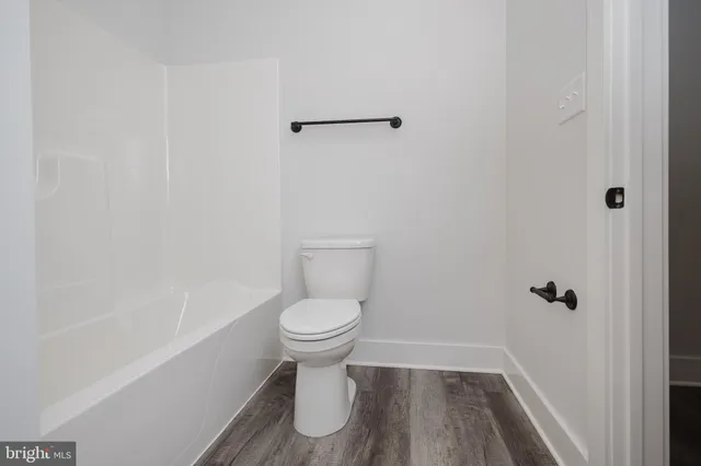 a view of a house with a wooden floor