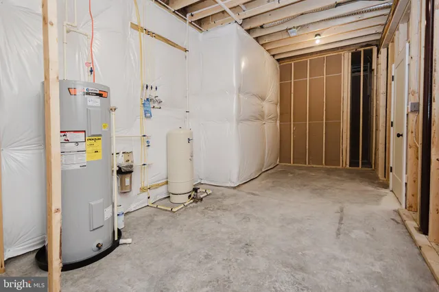 a view of house with outdoor space and trees