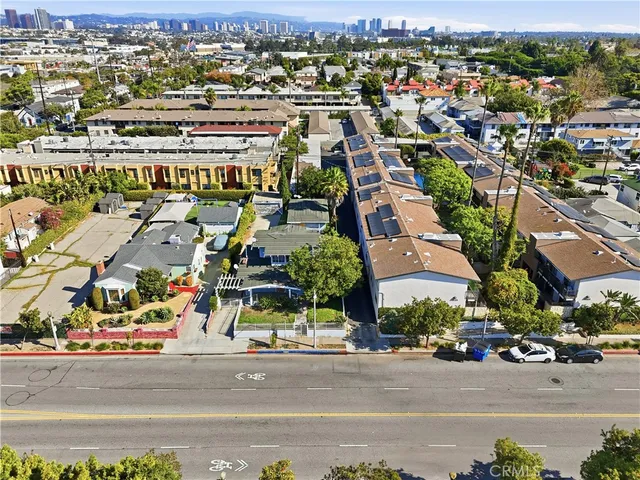an aerial view of a city with streets and houses