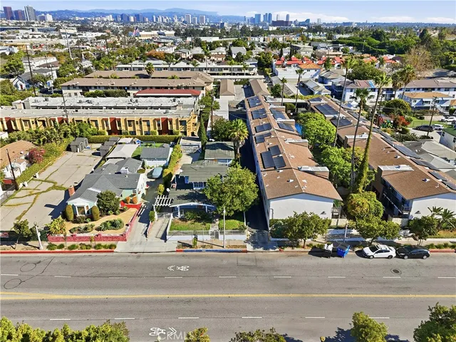 an aerial view of a city with streets and houses