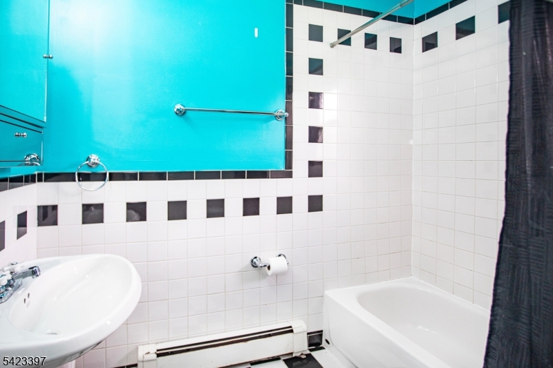1130 Valley Road, Unit 2B Wayne, NJ 07470 - Photo 21 of 47 a bathroom with a bathtub and shower