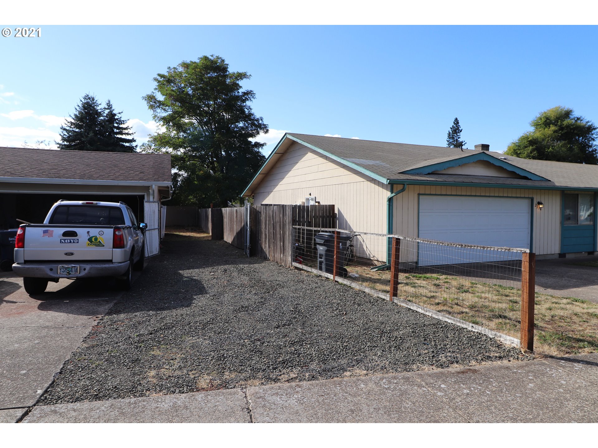 2310 6th Street Springfield, OR 97477 - Photo 32 of 32 a view of a car parked in front of a house