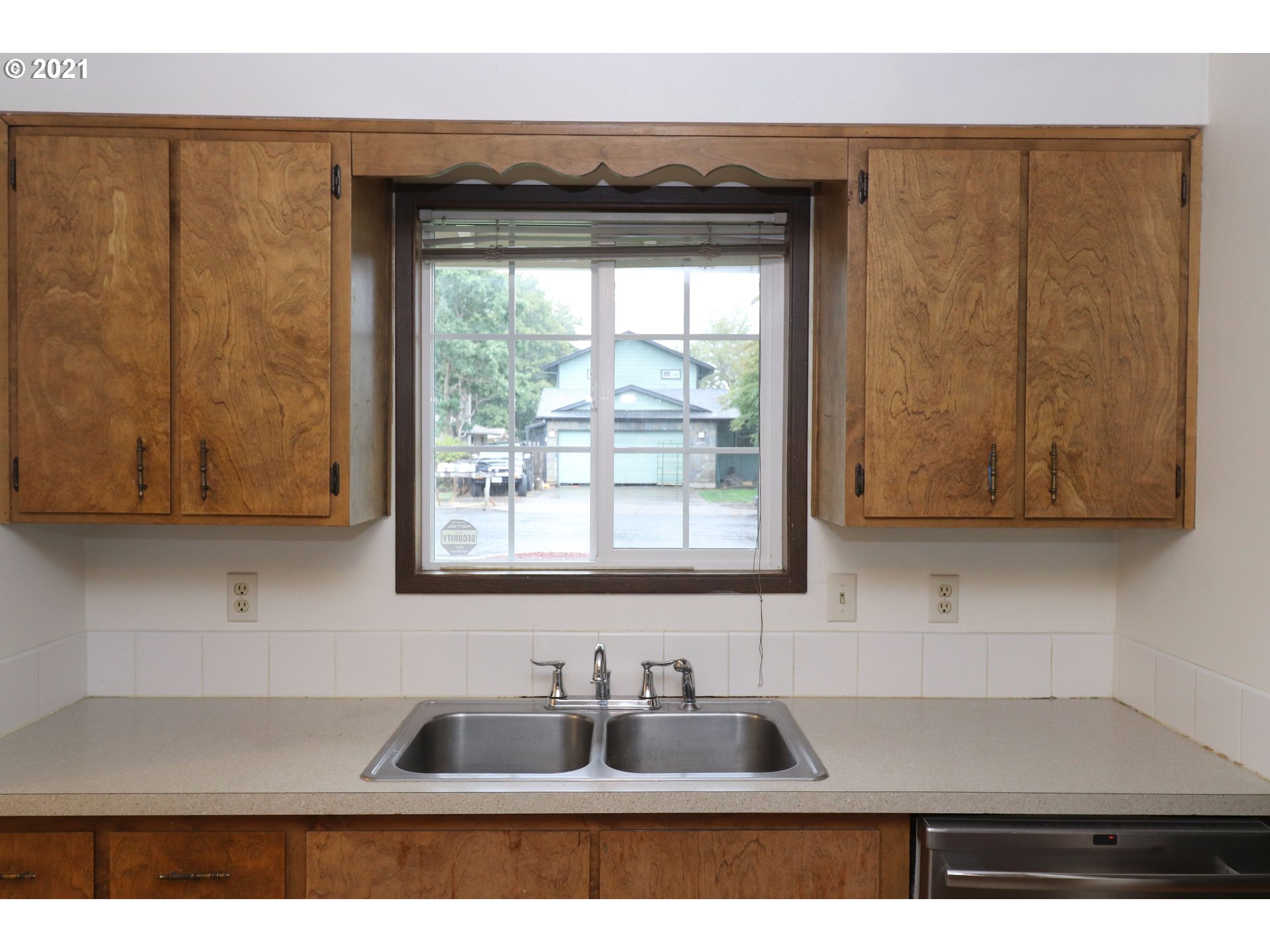 2310 6th Street Springfield, OR 97477 - Photo 8 of 32 a kitchen with a sink and a window