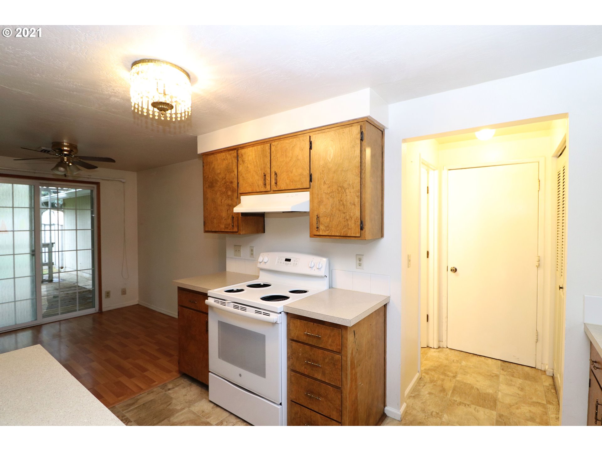 2310 6th Street Springfield, OR 97477 - Photo 9 of 32 a kitchen with a sink cabinets and appliances