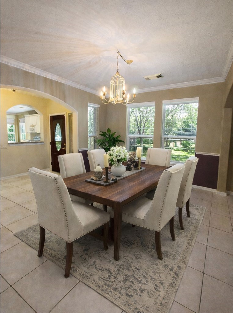 51 North Country Gate Circle Conroe, TX 77384 - Photo 4 of 27 Virtually Staged - Formal Dining Featuring large windows and Chandlier.