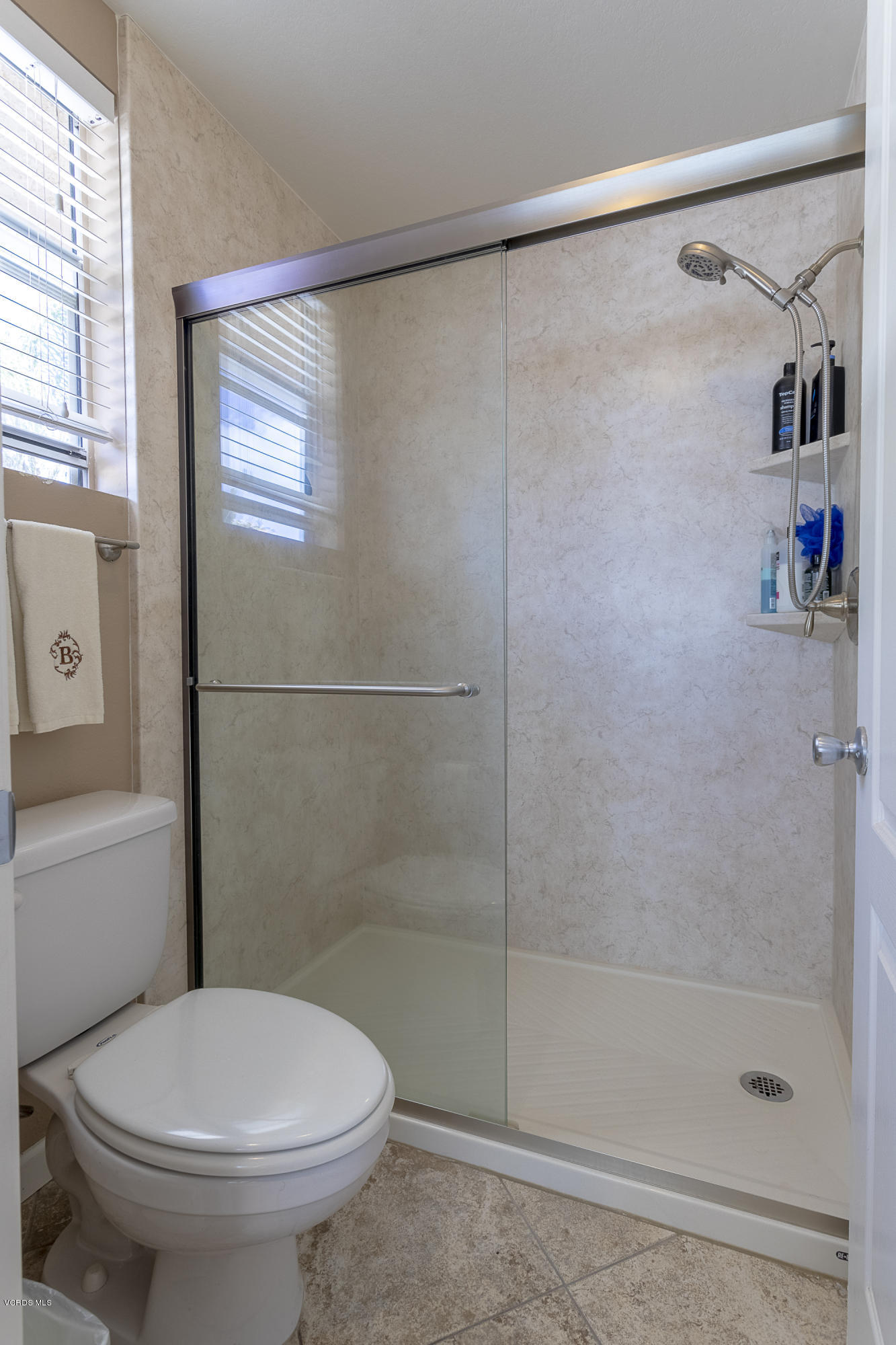 30 Iron Ridge Lane Simi Valley, CA 93065 - Photo 14 of 31 a bathroom with a shower and a toilet