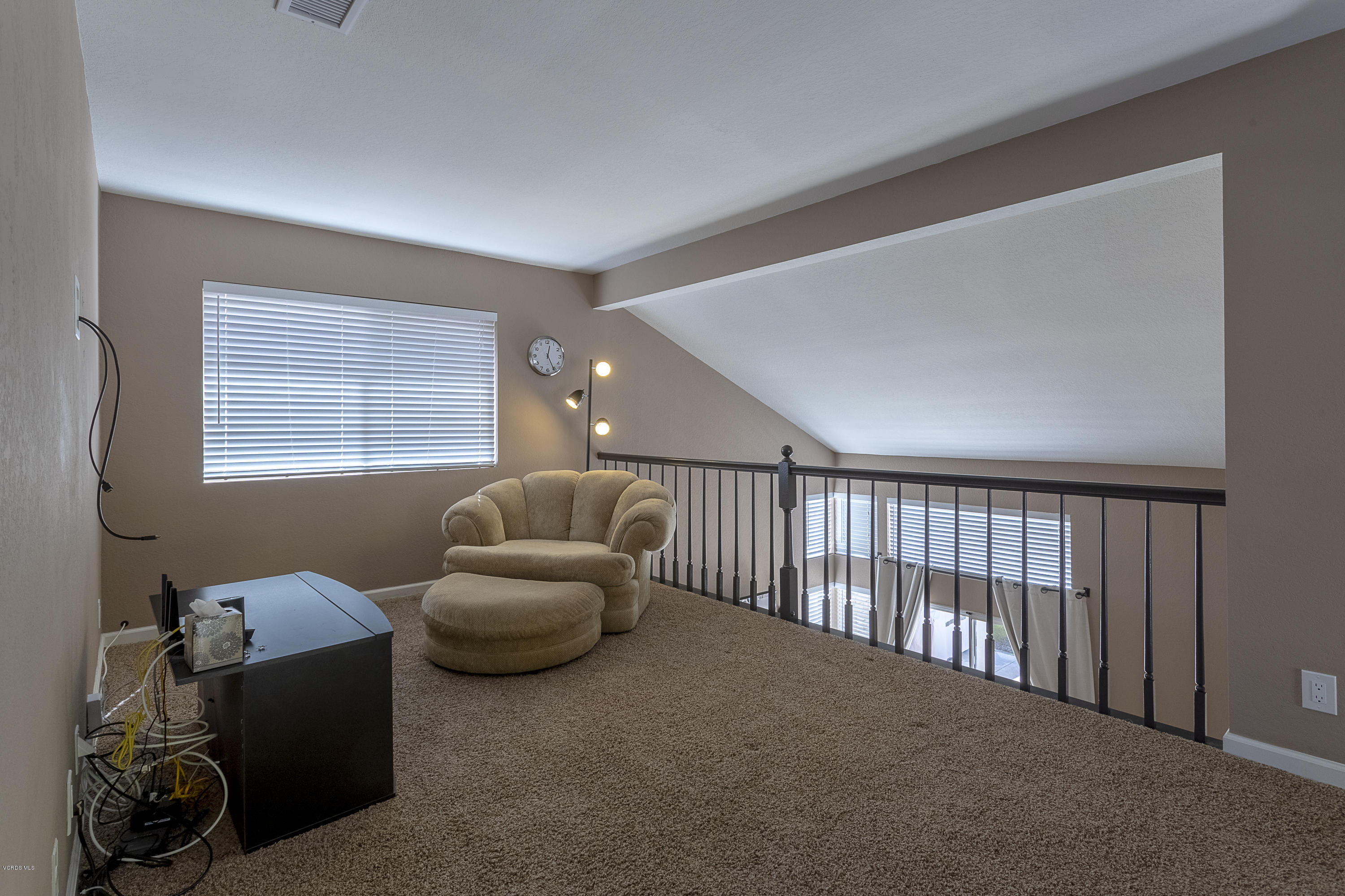 30 Iron Ridge Lane Simi Valley, CA 93065 - Photo 16 of 31 a livingroom with furniture and a window