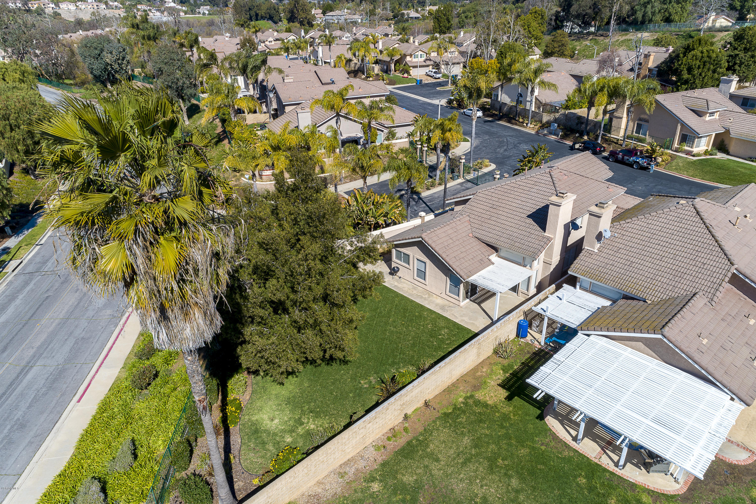 30 Iron Ridge Lane Simi Valley, CA 93065 - Photo 24 of 31 an aerial view of a house with a garden and swimming pool