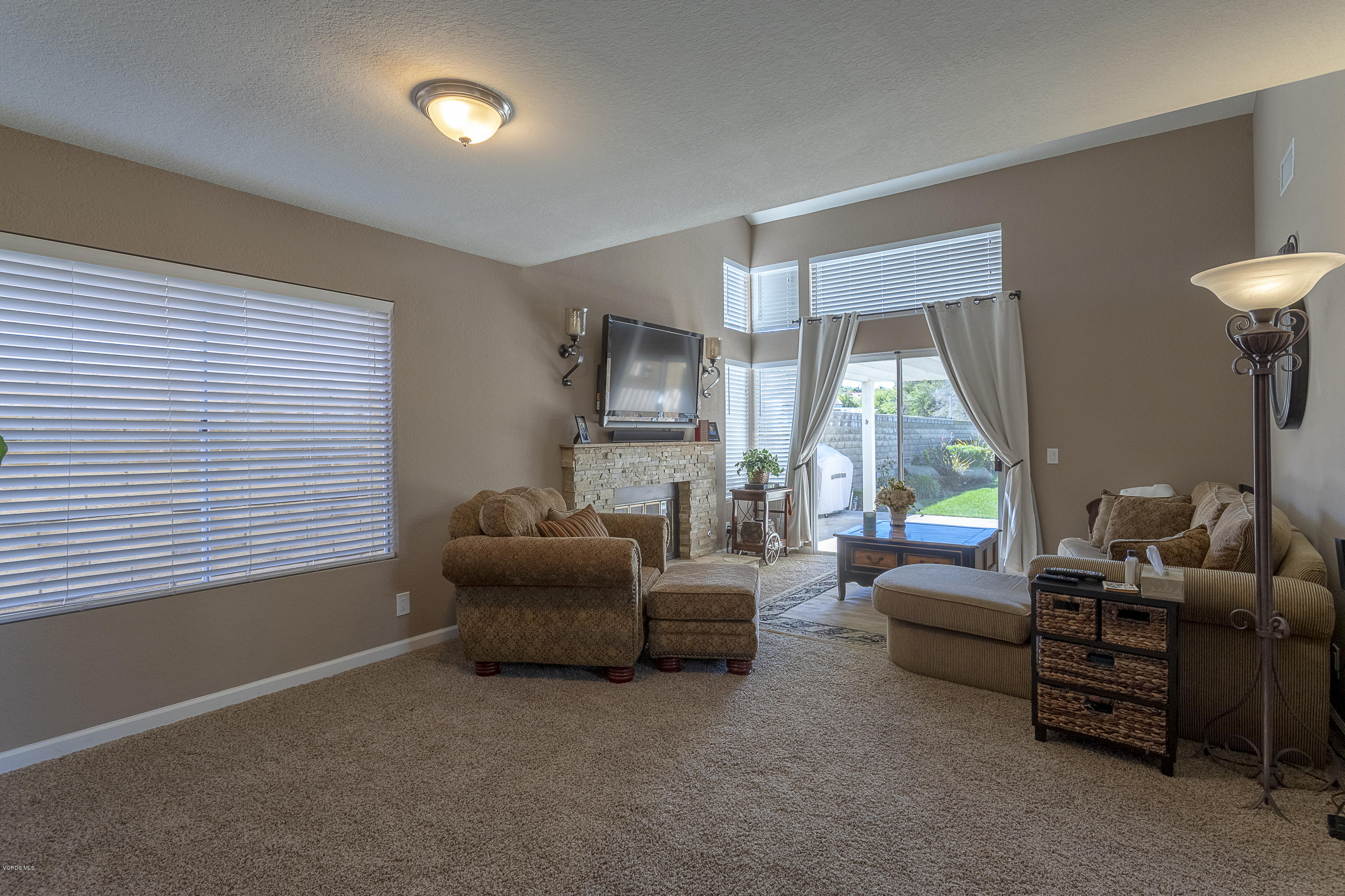 30 Iron Ridge Lane Simi Valley, CA 93065 - Photo 4 of 31 a living room with furniture and a large window