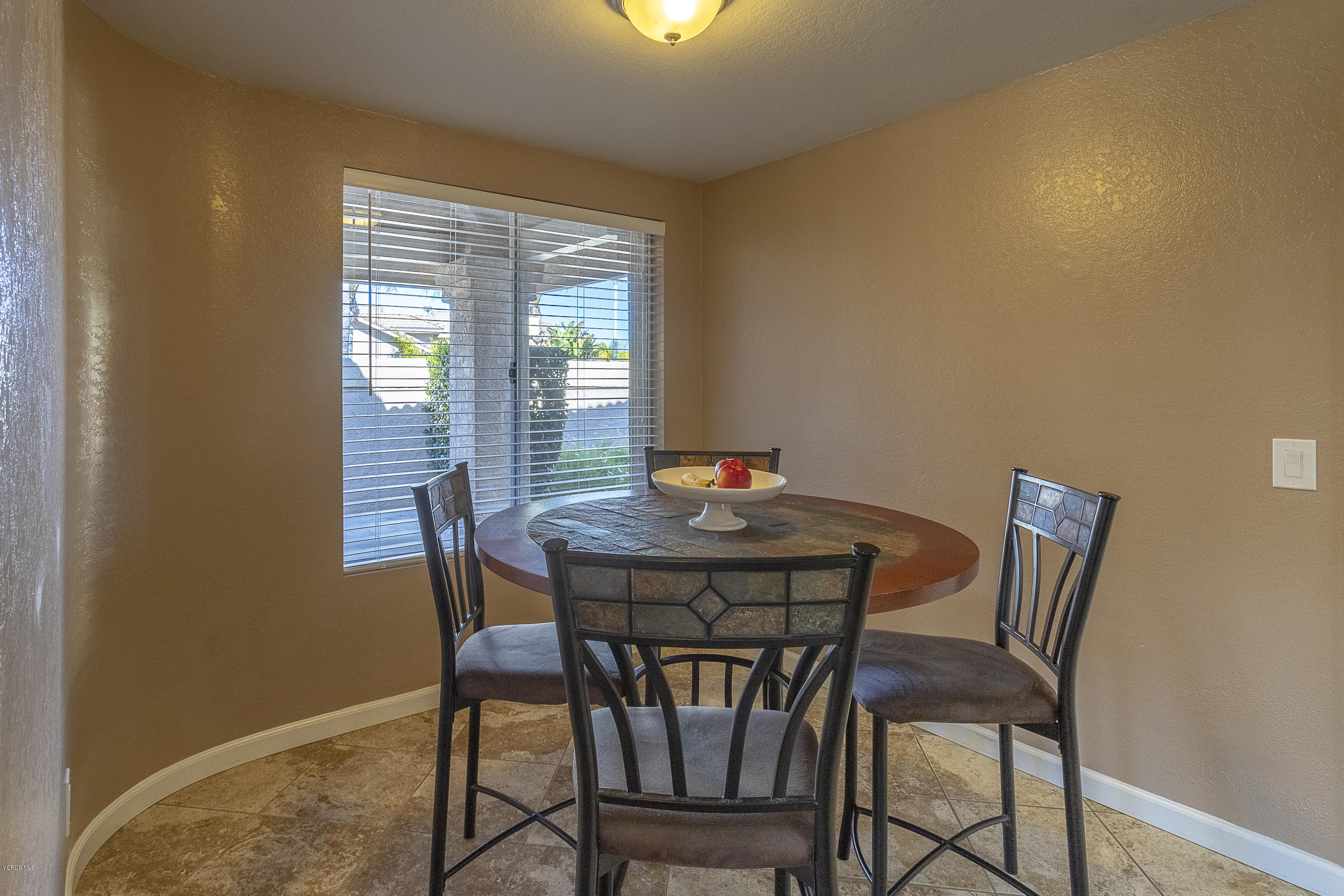 30 Iron Ridge Lane Simi Valley, CA 93065 - Photo 7 of 31 a view of a dining room with furniture and window