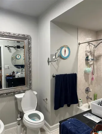 a view of a bathroom sink and a mirror