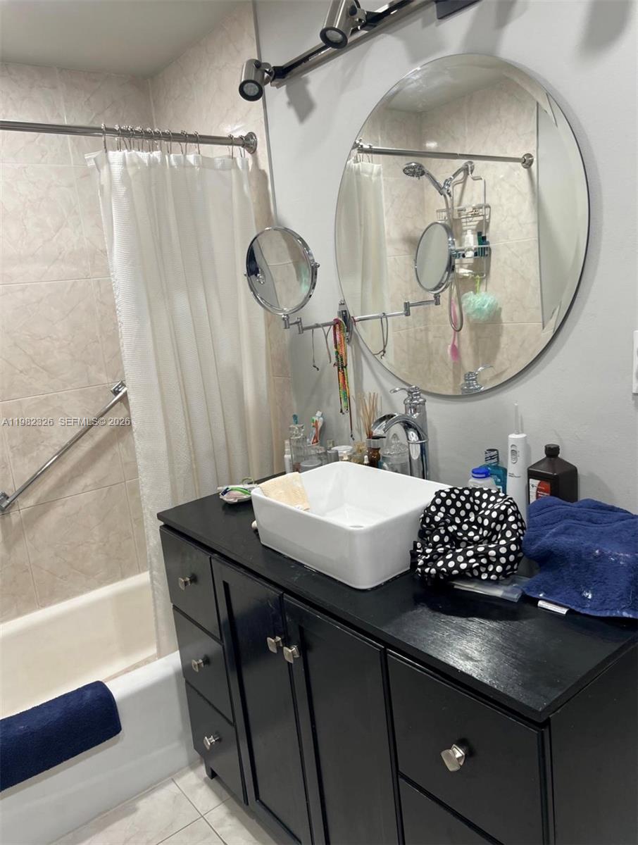 2190 Southwest 22nd Terrace Miami, FL 33145 - Photo 16 of 37 a view of a bathroom sink and a mirror