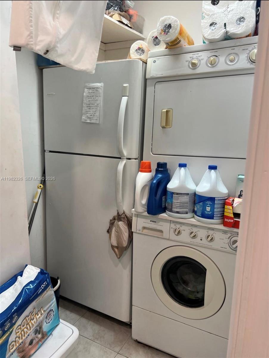 2190 Southwest 22nd Terrace Miami, FL 33145 - Photo 17 of 37 a utility room with dryer and washer