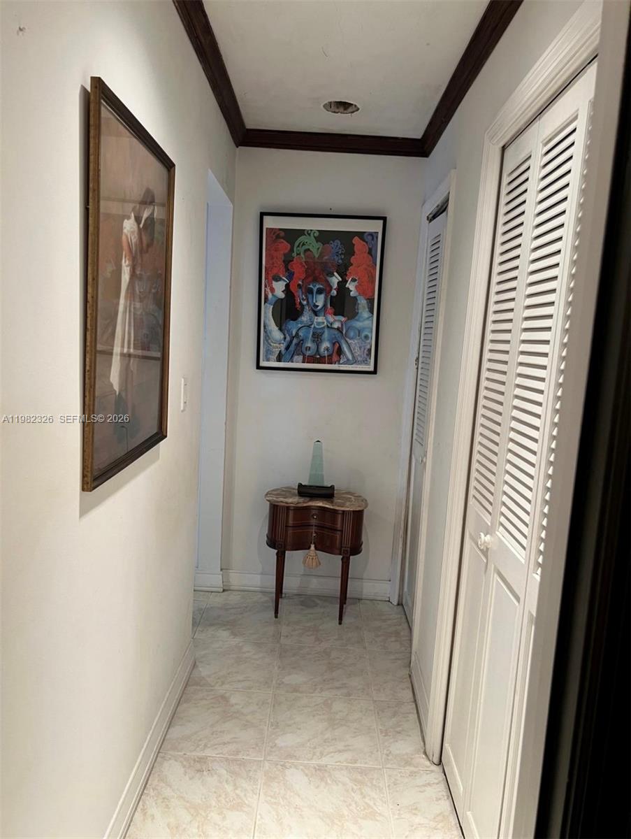 2190 Southwest 22nd Terrace Miami, FL 33145 - Photo 20 of 37 a bedroom with furniture and a window