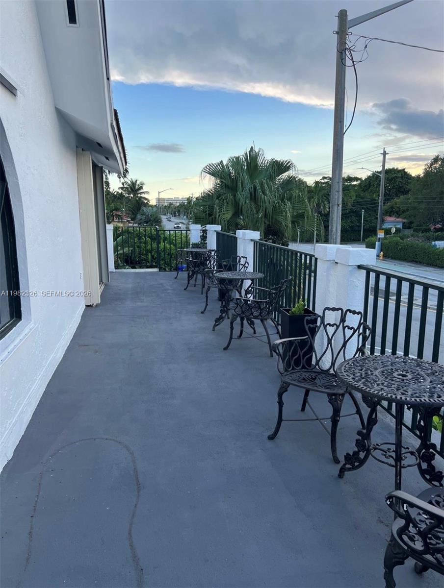2190 Southwest 22nd Terrace Miami, FL 33145 - Photo 21 of 37 a view of a patio with a table and chairs