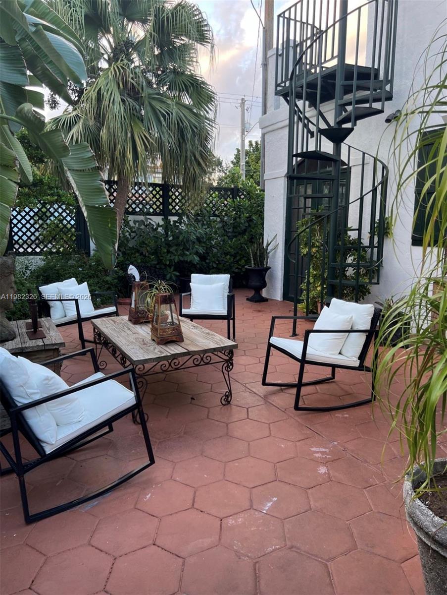 2190 Southwest 22nd Terrace Miami, FL 33145 - Photo 27 of 37 a view of a terrace with furniture and a potted plant