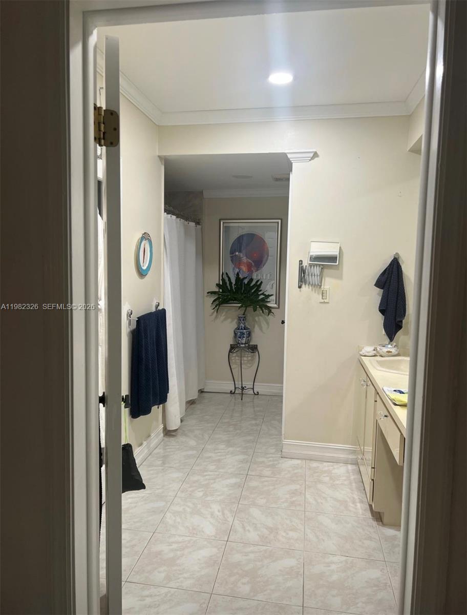 2190 Southwest 22nd Terrace Miami, FL 33145 - Photo 32 of 37 a view of hallway with washer and dryer