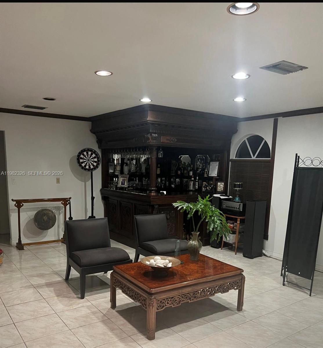2190 Southwest 22nd Terrace Miami, FL 33145 - Photo 36 of 37 a living room with furniture a piano and a flat screen tv