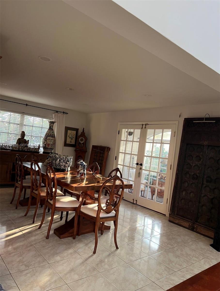 2190 Southwest 22nd Terrace Miami, FL 33145 - Photo 6 of 37 a living room with furniture and wooden floor