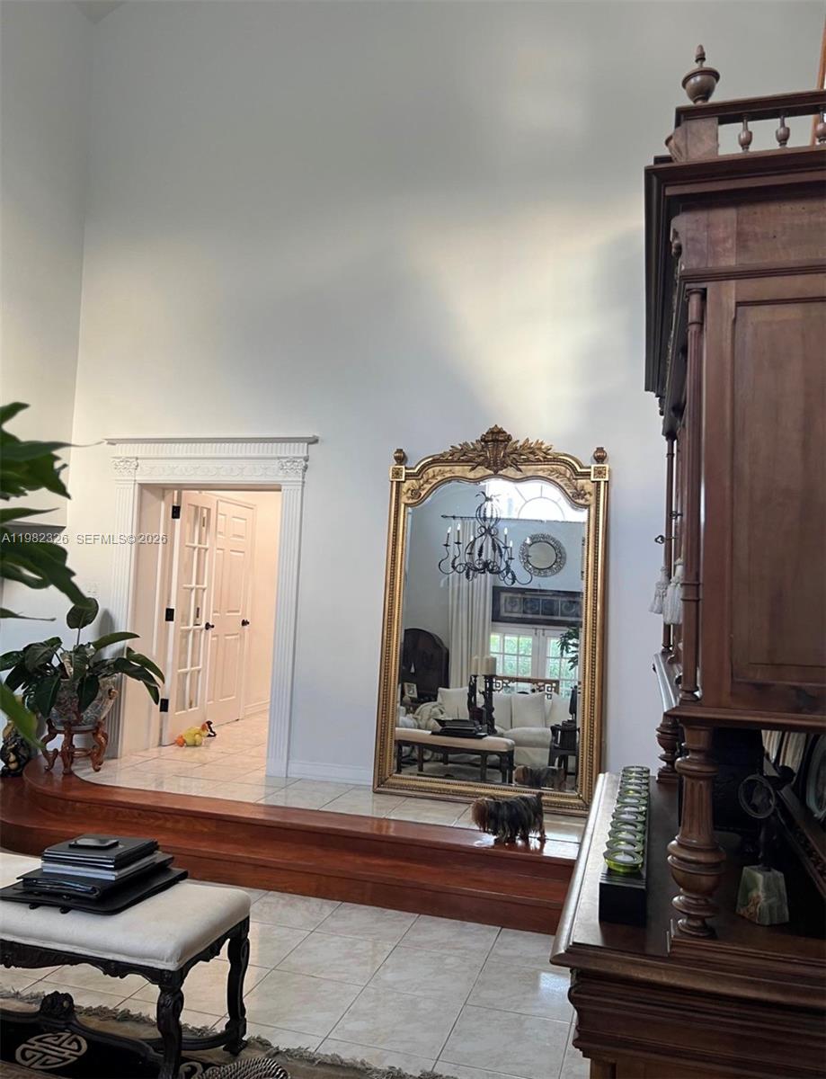 2190 Southwest 22nd Terrace Miami, FL 33145 - Photo 10 of 37 a living room with furniture and a mirror