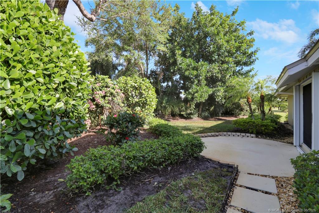 5701 Southeast Winged Foot Drive Stuart, FL 34997 - Photo 38 of 47 a view of a garden with plants