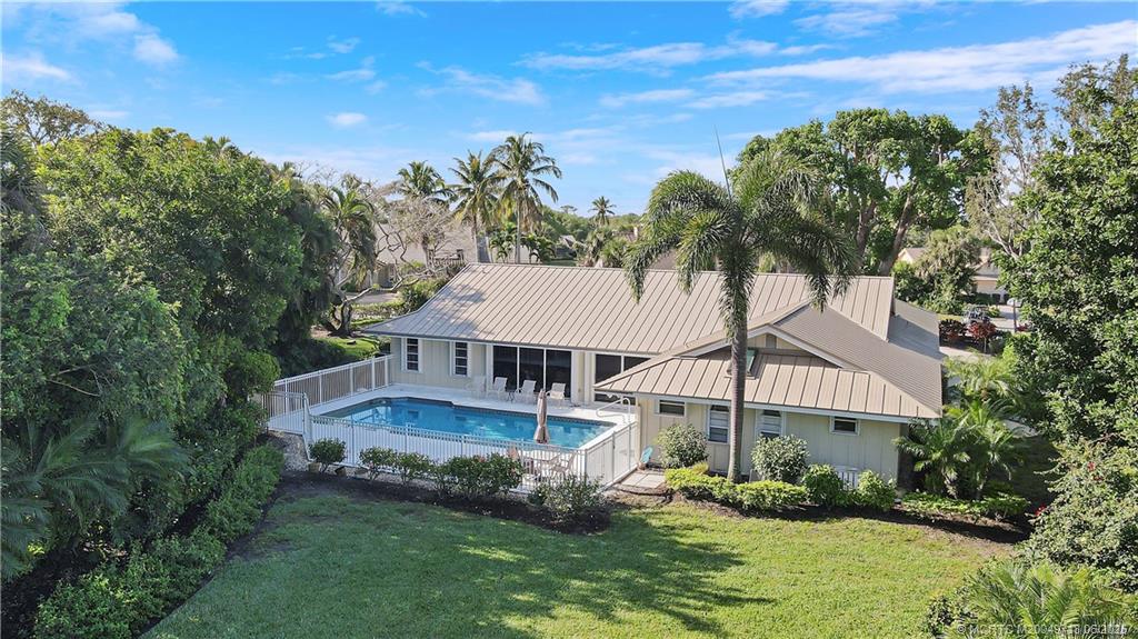 5701 Southeast Winged Foot Drive Stuart, FL 34997 - Photo 39 of 47 an aerial view of a house