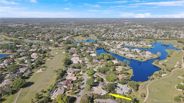 an aerial view of residential building with parking space