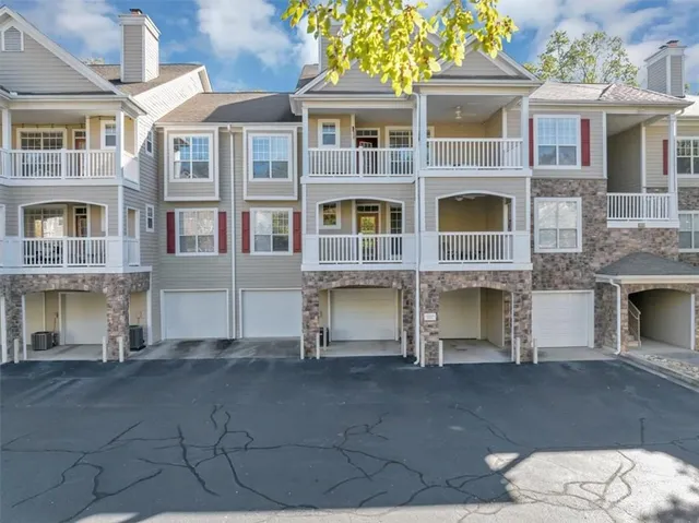 a front view of a building with balcony