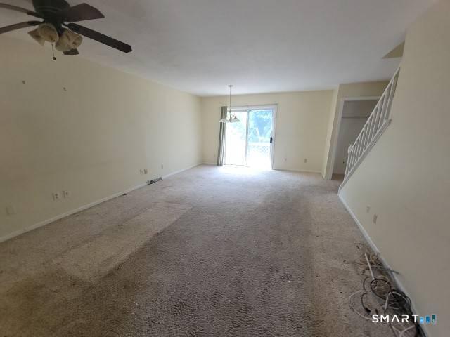 28 Commodore Cmns, Unit 28 Derby, CT 06418 - Photo 4 of 17 a view of empty room with windows