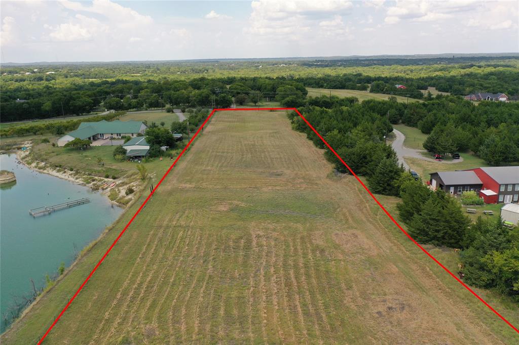 Tbd Baker Ridge Road Sherman, TX 75090 - Photo 4 of 21 a view of a lake with a big yard