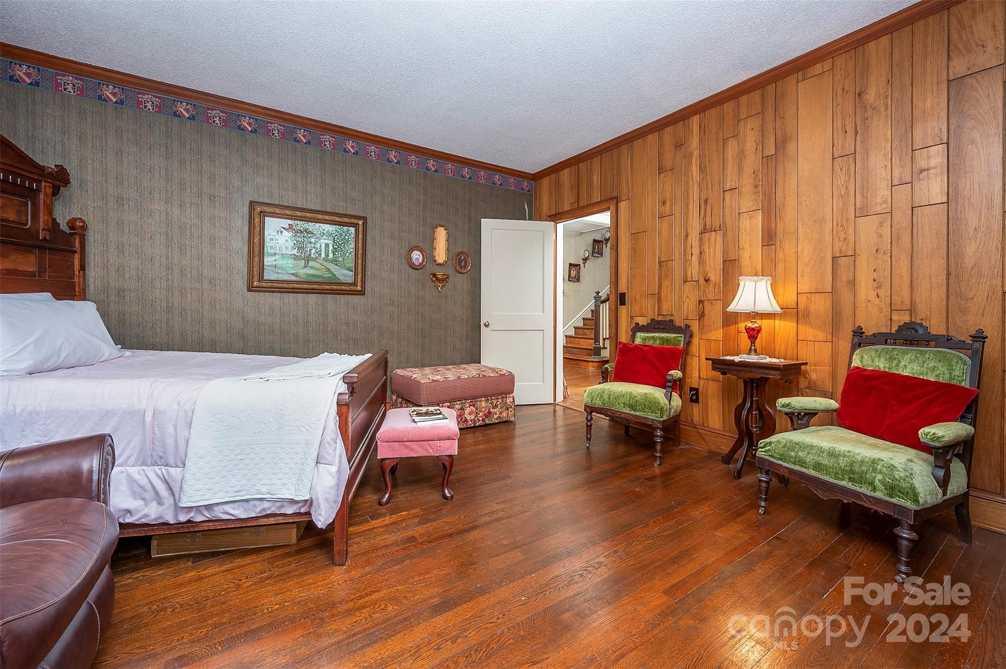 267 South Ridgecrest Avenue Rutherfordton, NC 28139 - Photo 12 of 48 a living room with furniture and wooden floor