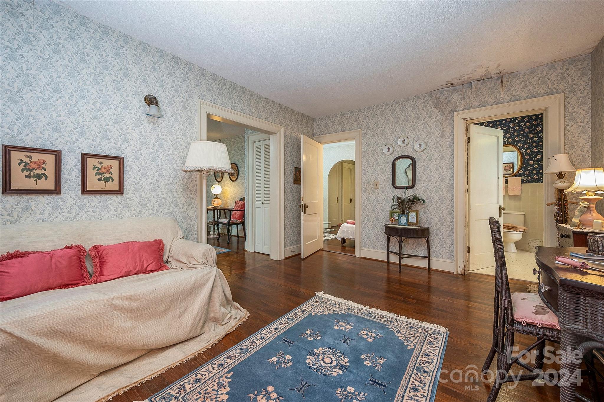 267 South Ridgecrest Avenue Rutherfordton, NC 28139 - Photo 27 of 48 a living room with furniture and wooden floor