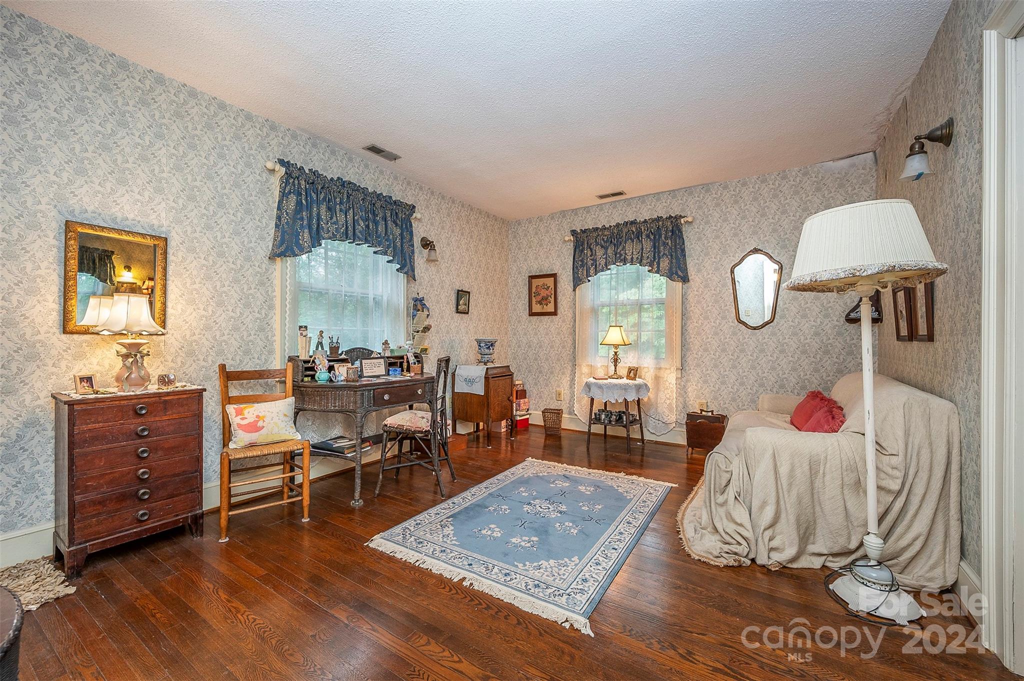 267 South Ridgecrest Avenue Rutherfordton, NC 28139 - Photo 30 of 48 a living room with furniture and wooden floor