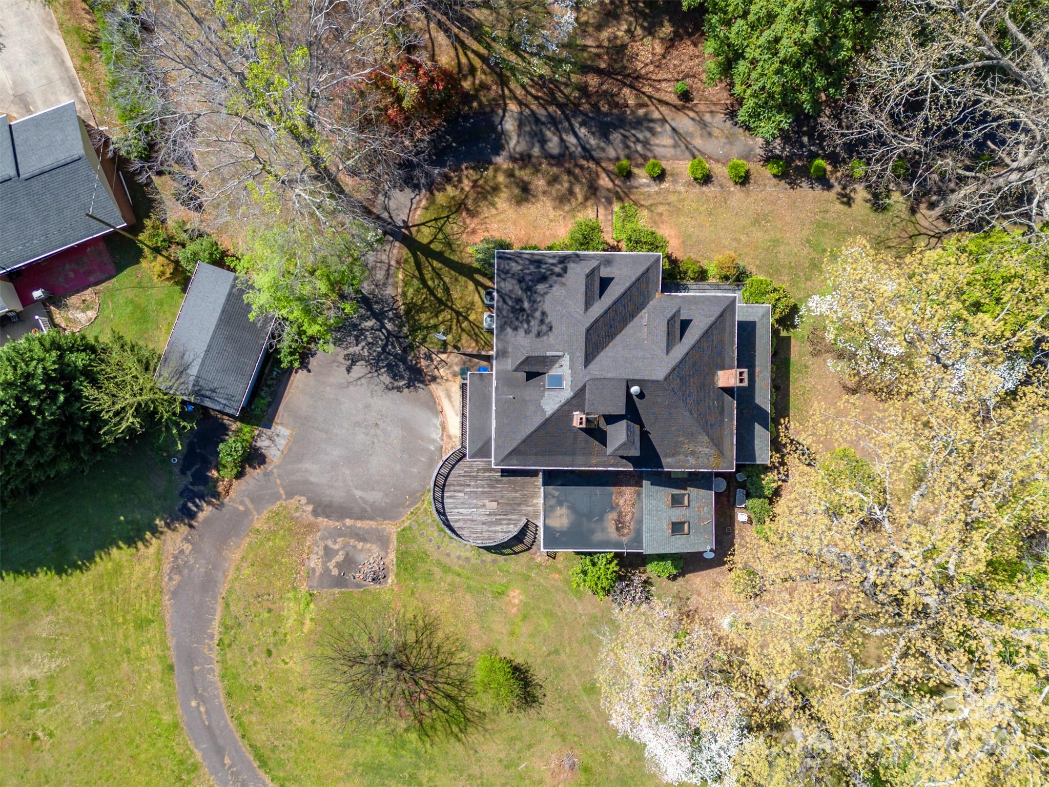267 South Ridgecrest Avenue Rutherfordton, NC 28139 - Photo 45 of 48 a aerial view of a house with swimming pool and large trees
