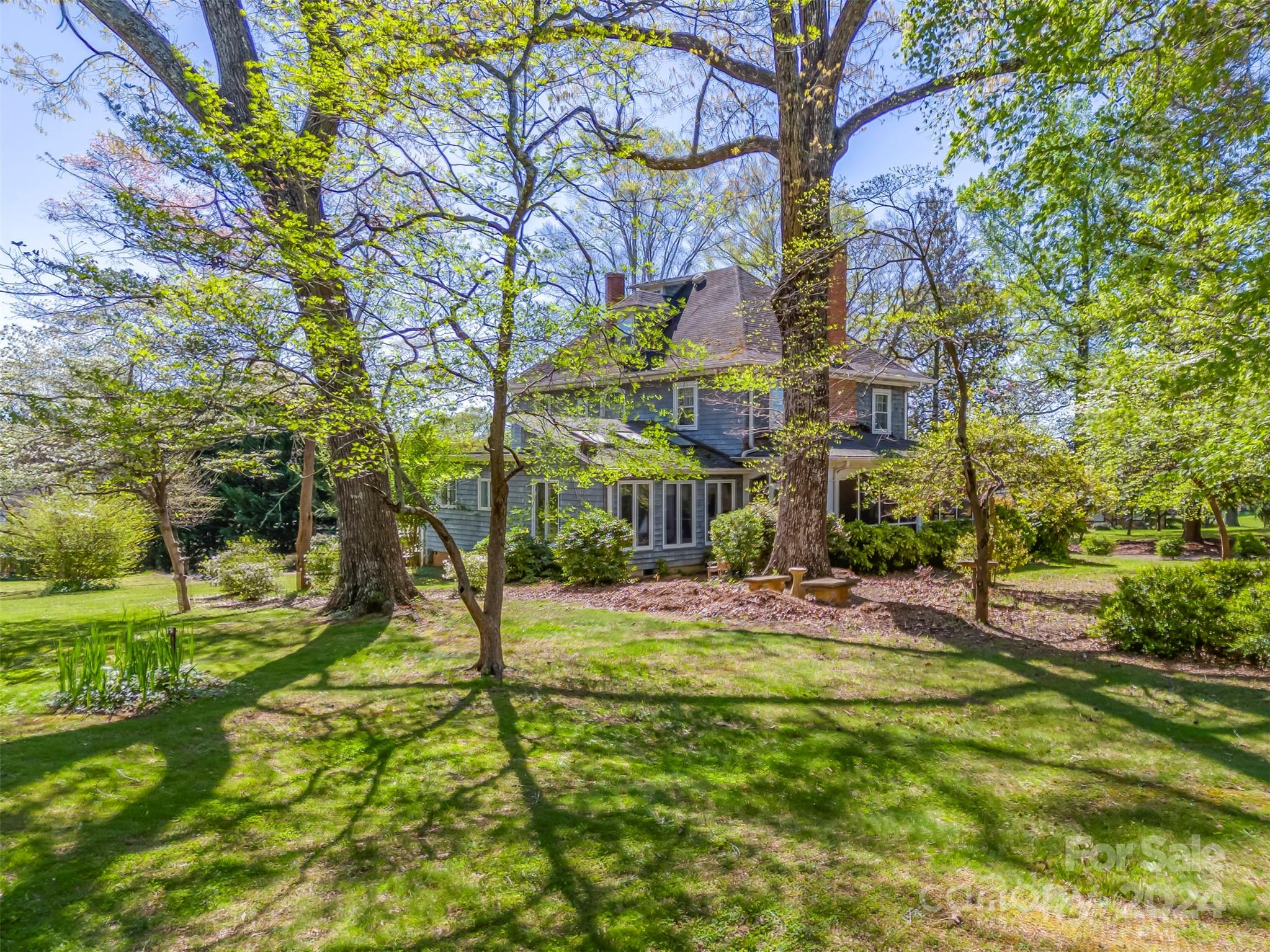 267 South Ridgecrest Avenue Rutherfordton, NC 28139 - Photo 5 of 48 a view of an house with backyard and trees