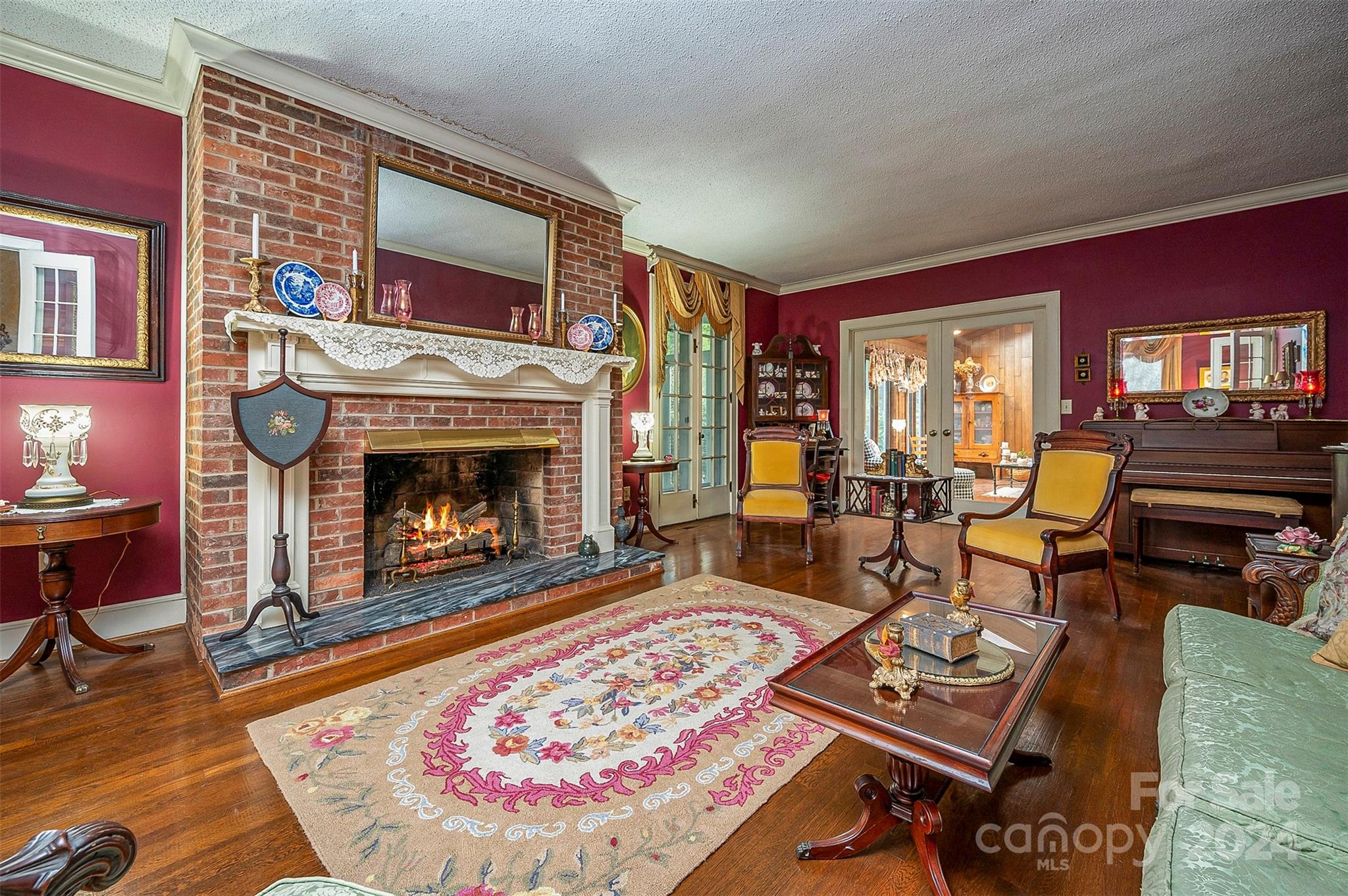 267 South Ridgecrest Avenue Rutherfordton, NC 28139 - Photo 10 of 48 a living room with furniture a rug and a fireplace