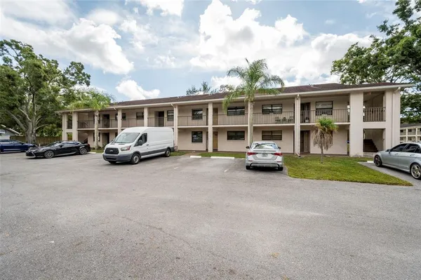 a car parked in front of a house