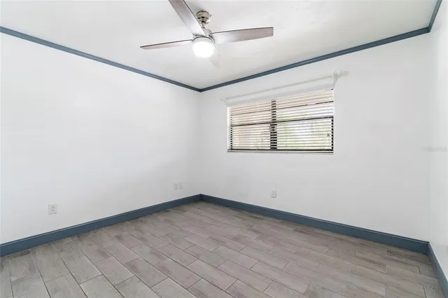a bathroom with a sink vanity mirror and shower