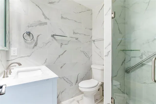 a sign broad in front of the tree