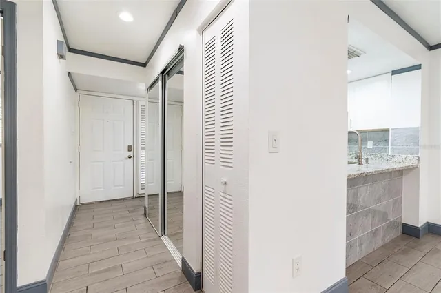 a kitchen with stainless steel appliances granite countertop a stove and a refrigerator