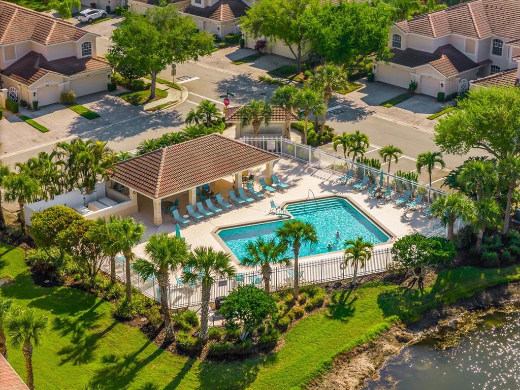 4500 Streamside Court, Unit 1408 Sarasota, FL 34238 - Photo 3 of 73 an aerial view of residential houses with outdoor space and street view