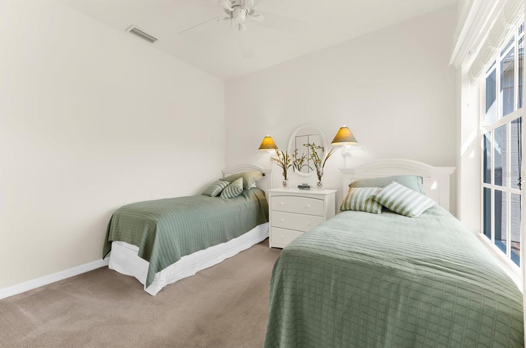 4500 Streamside Court, Unit 1408 Sarasota, FL 34238 - Photo 43 of 73 a bedroom with a bed and a window