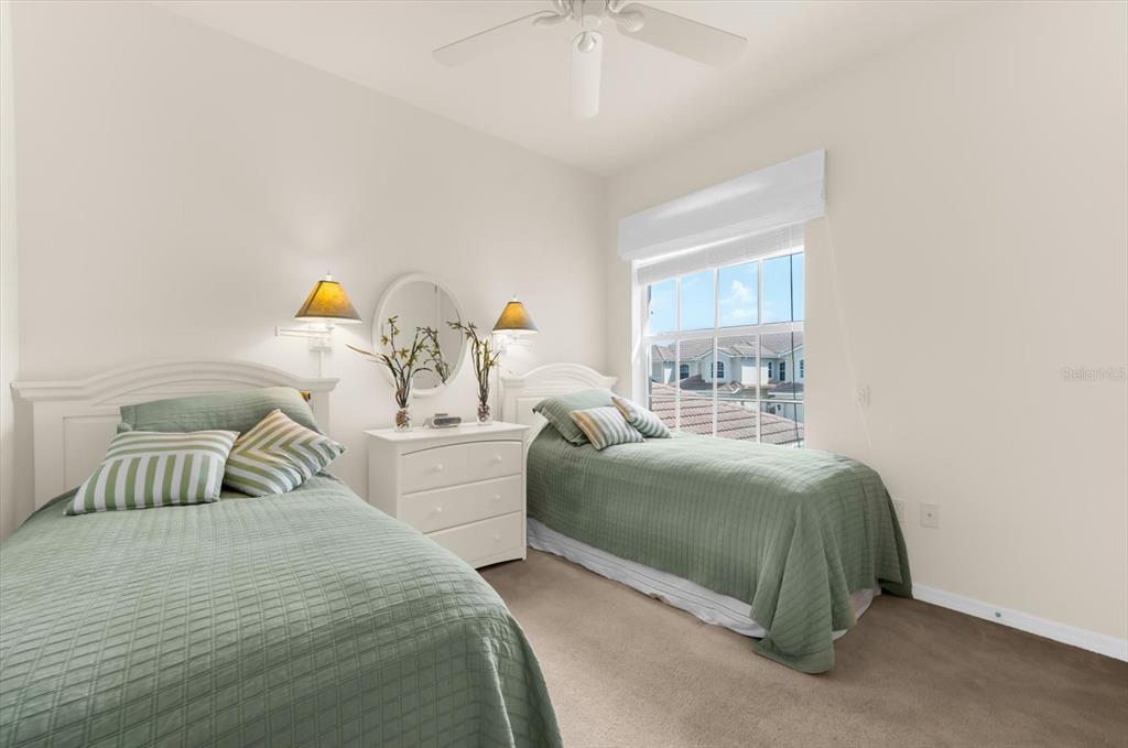 4500 Streamside Court, Unit 1408 Sarasota, FL 34238 - Photo 44 of 73 a bedroom with a bed and a window